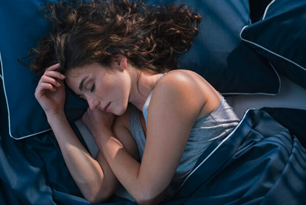 Woman sleeping peacefully in bed