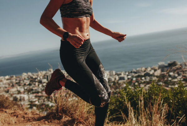Woman running outdoors during a workout