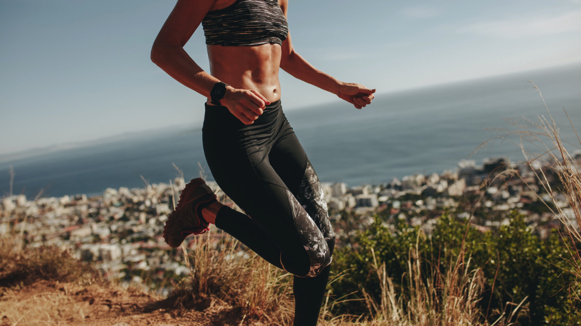 Woman running outdoors during a workout