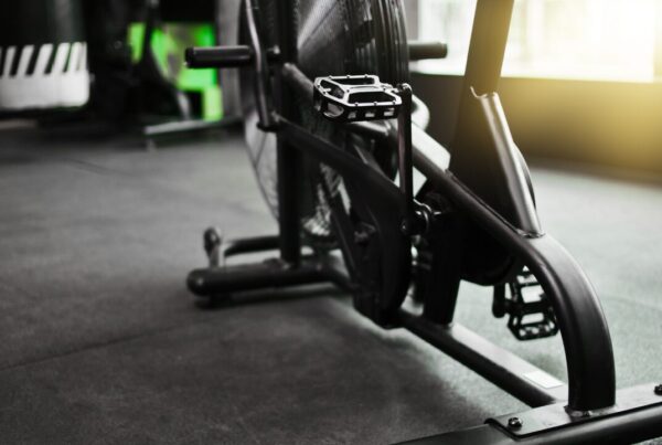 Woman strength training with dumbbells instead of doing cardio